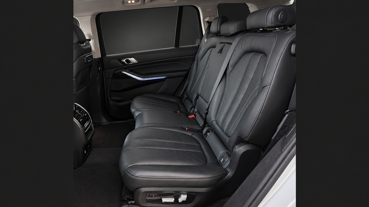 BMW X7 rear seats and cabin, with adjusted lighting.