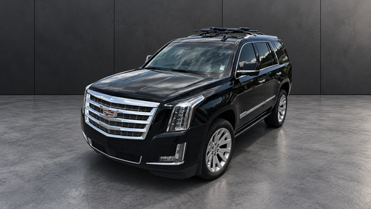 Cadillac Escalade vehicle photo with edited background and lighting.